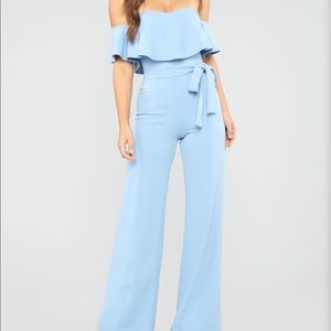 Brand new “servin looks” jumpsuit! Never worn.